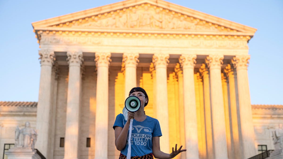 A protester outside the US Supreme Court after justices there declined to block the new Texas abortion law, instead letting the legal battle play out in the lower courts.
