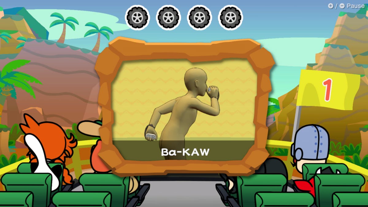 A game where a person making a bird-like gesture is shown on the screen