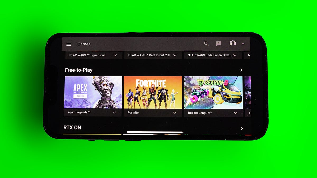 GeForce Now running on the iPhone 13 Pro showing Fortnite, Apex Legends and Rocket League thumbnails