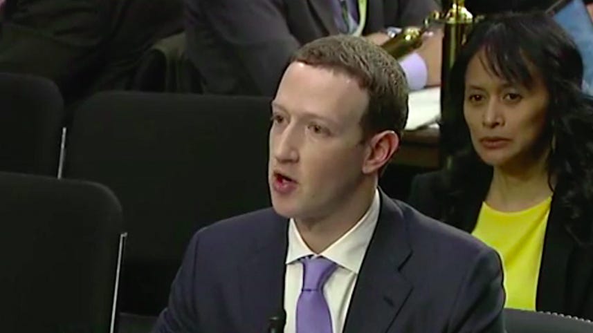 Zuckerberg evasive on letting Facebook users pay to remove ads