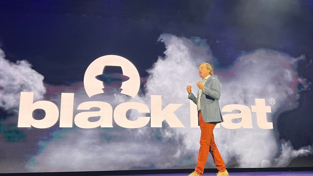 An image of Chris Krebs speaking at the Black Hat conference in Las Vegas, Nevada.