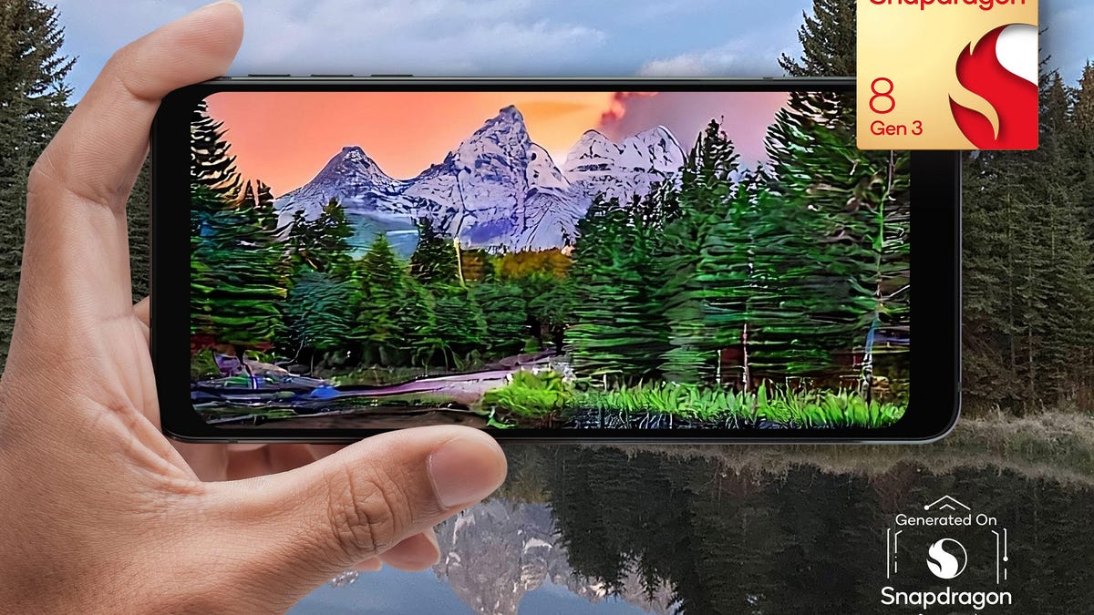 A phone takes a photo of a mountain landscape with the Snapdragon 8 Gen 3 chip logo in the corner.