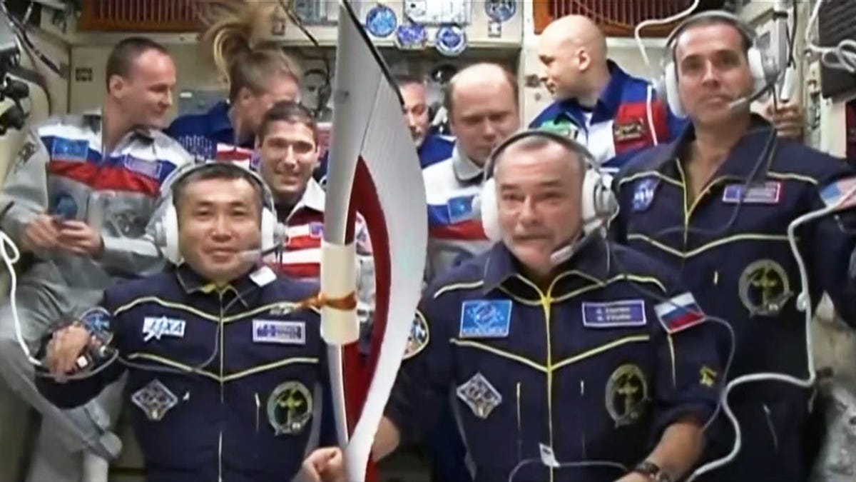 Olympic torch lands on International Space Station