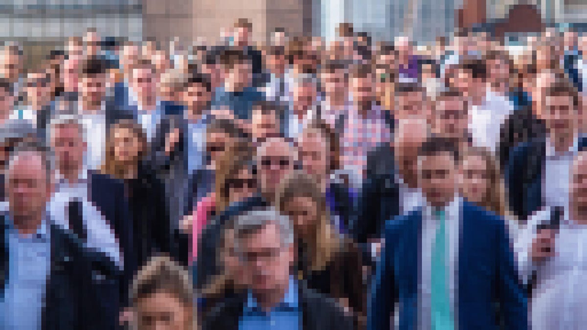 Pixelated image of commuters making their way to work