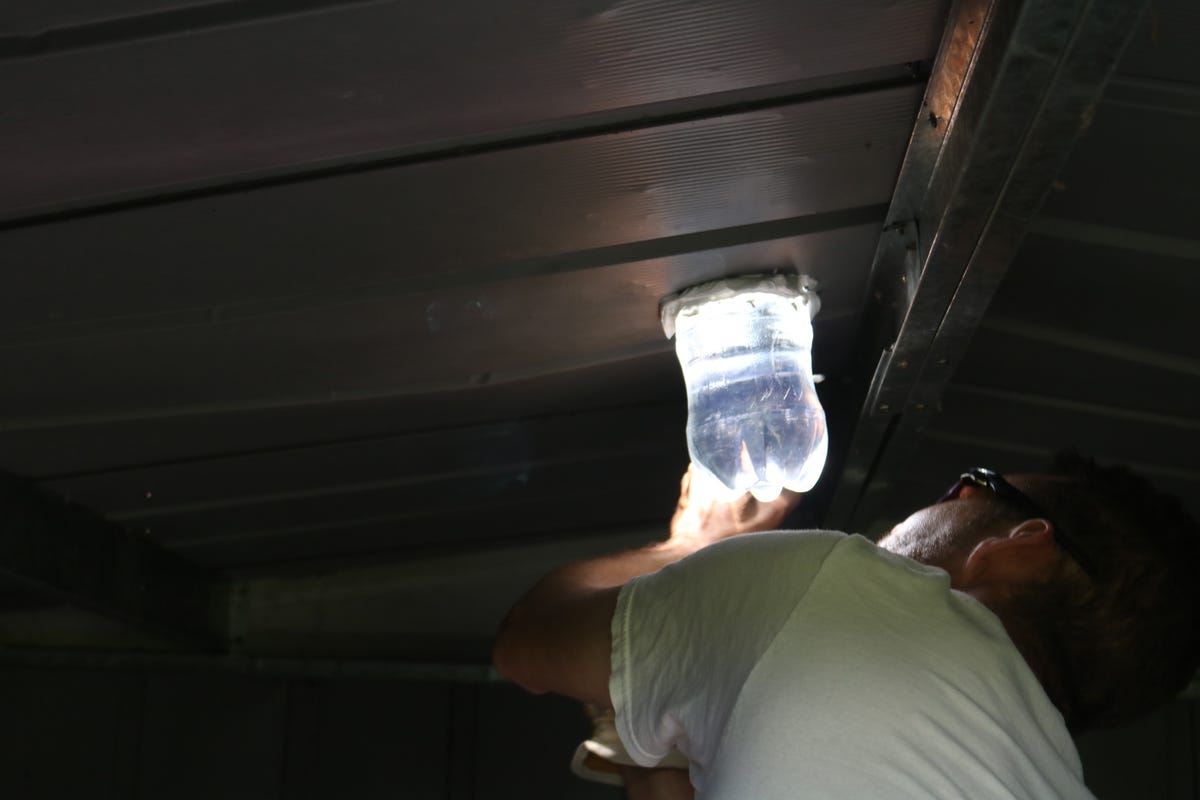 Make a solar light for your tool shed using a soda bottle - CNET