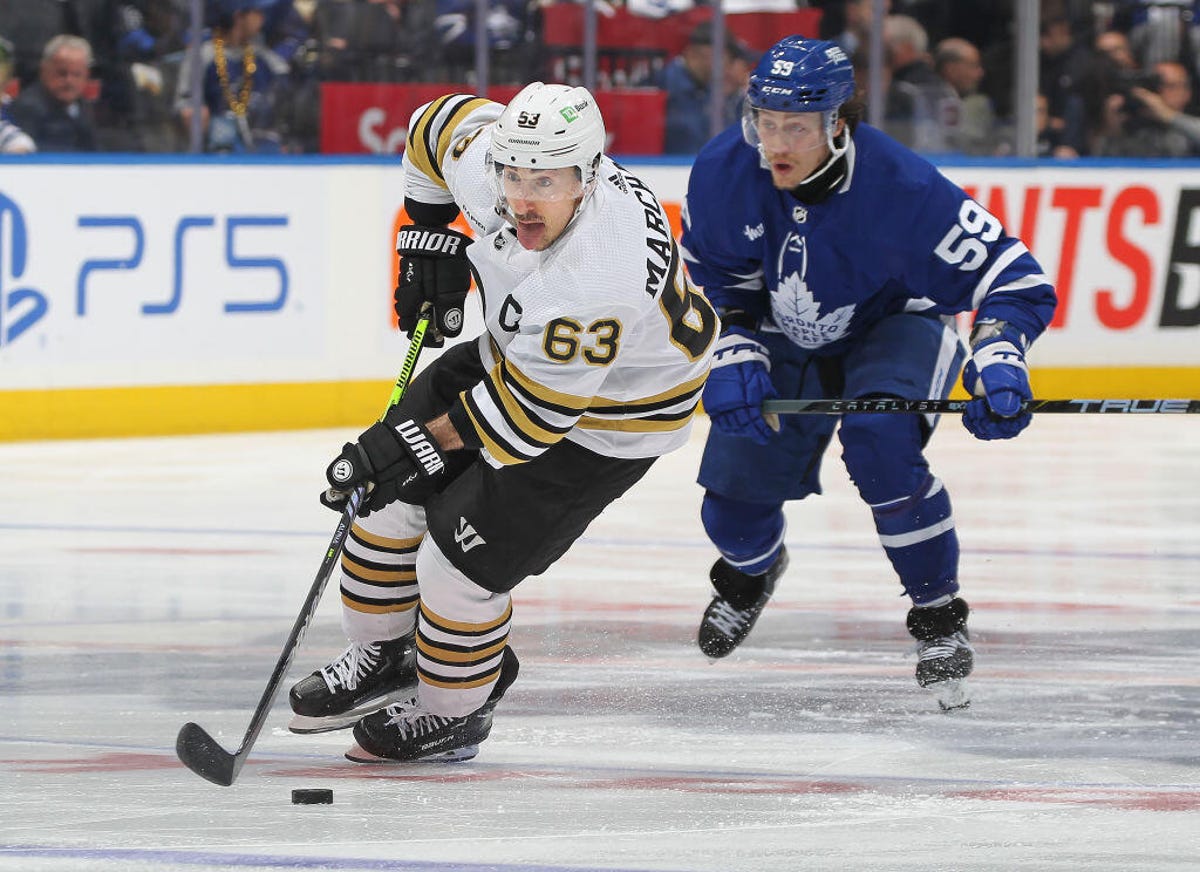 Brad Marchand #63 of the Boston Bruins skates with the puck against the Toronto Maple Leafs in Game Four of the First Round of the 2024 Stanley Cup Playoffs