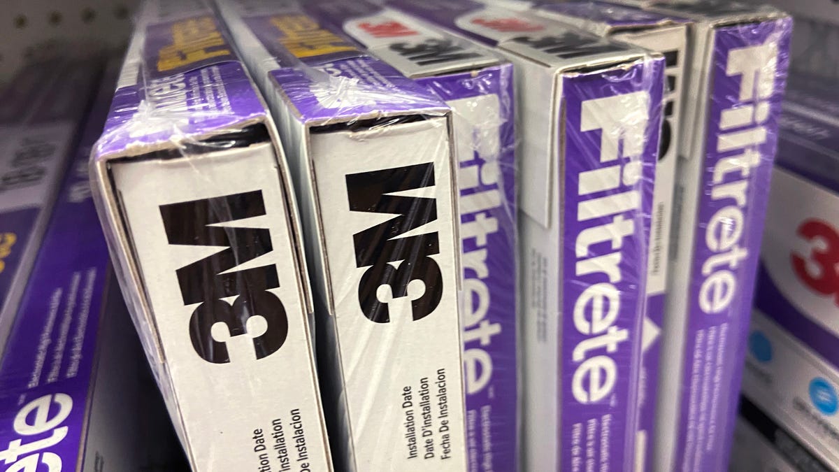 A row of furnace filters on a store's shelf