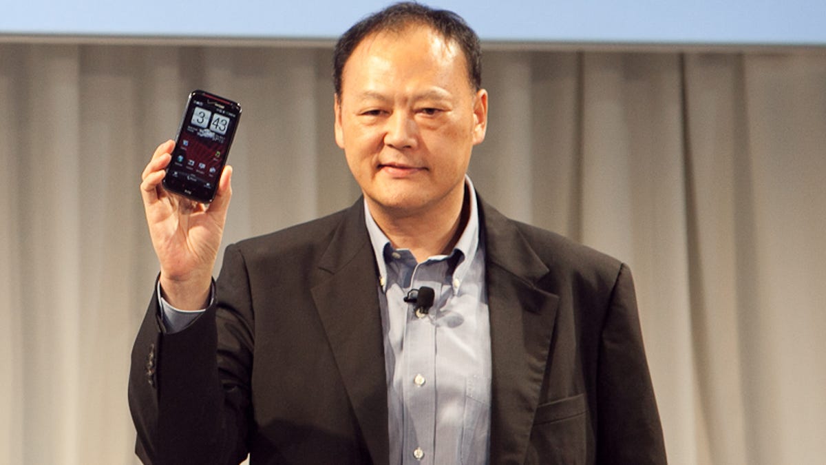 HTC CEO Peter Chou holds aloft the HTC Rezound.