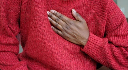 A person clutching their chest