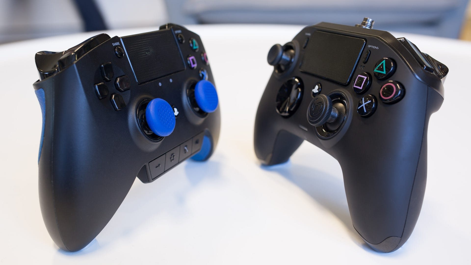 Putting PlayStation 4's elite controllers head-to-head - CNET