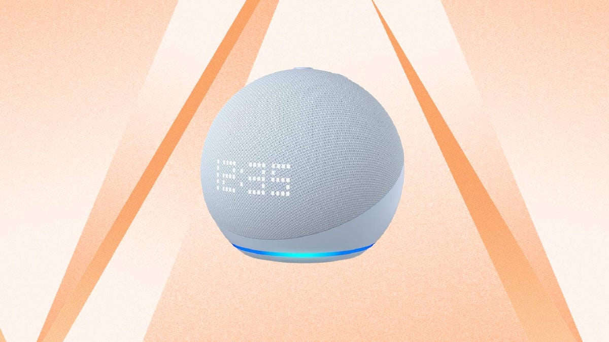 A white Echo Dot speaker with clock against an orange background.