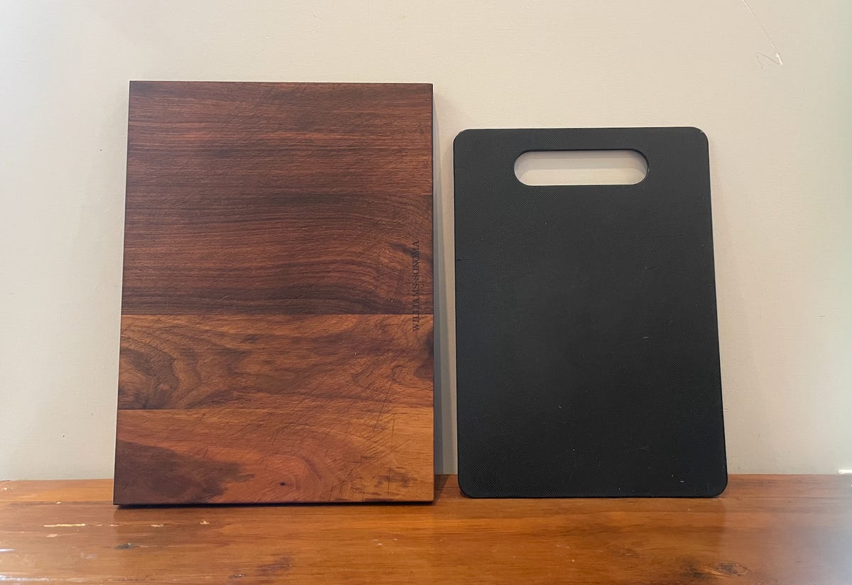 wood cutting board next to plastic cutting board