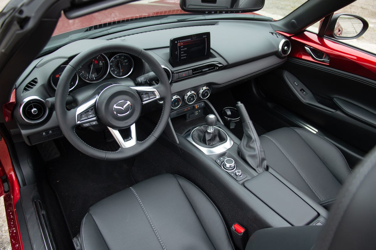 2022 Mazda MX-5 Miata, showing the cabin from outside and above