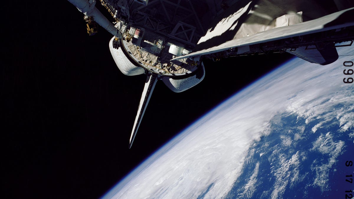 Space shuttle Challenger in orbit.