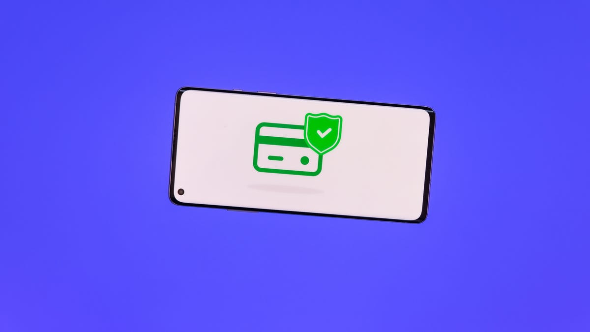 A phone screen showing a security check graphic