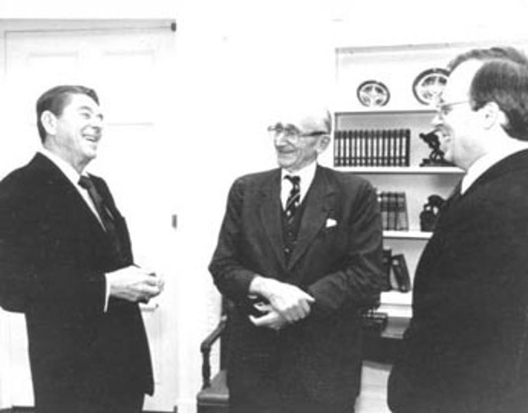 The Heritage Foundation, President Reagan's favorite think tank and longtime copyright hawk, is now warning of the dangers of SOPA. From left: Ronald Reagan, Nobel laureate F.A. Hayek, and Heritage President Ed Feulner.