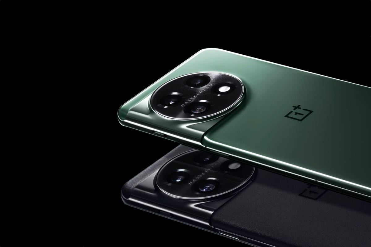 The backs of a green OnePlus 11 and a black one