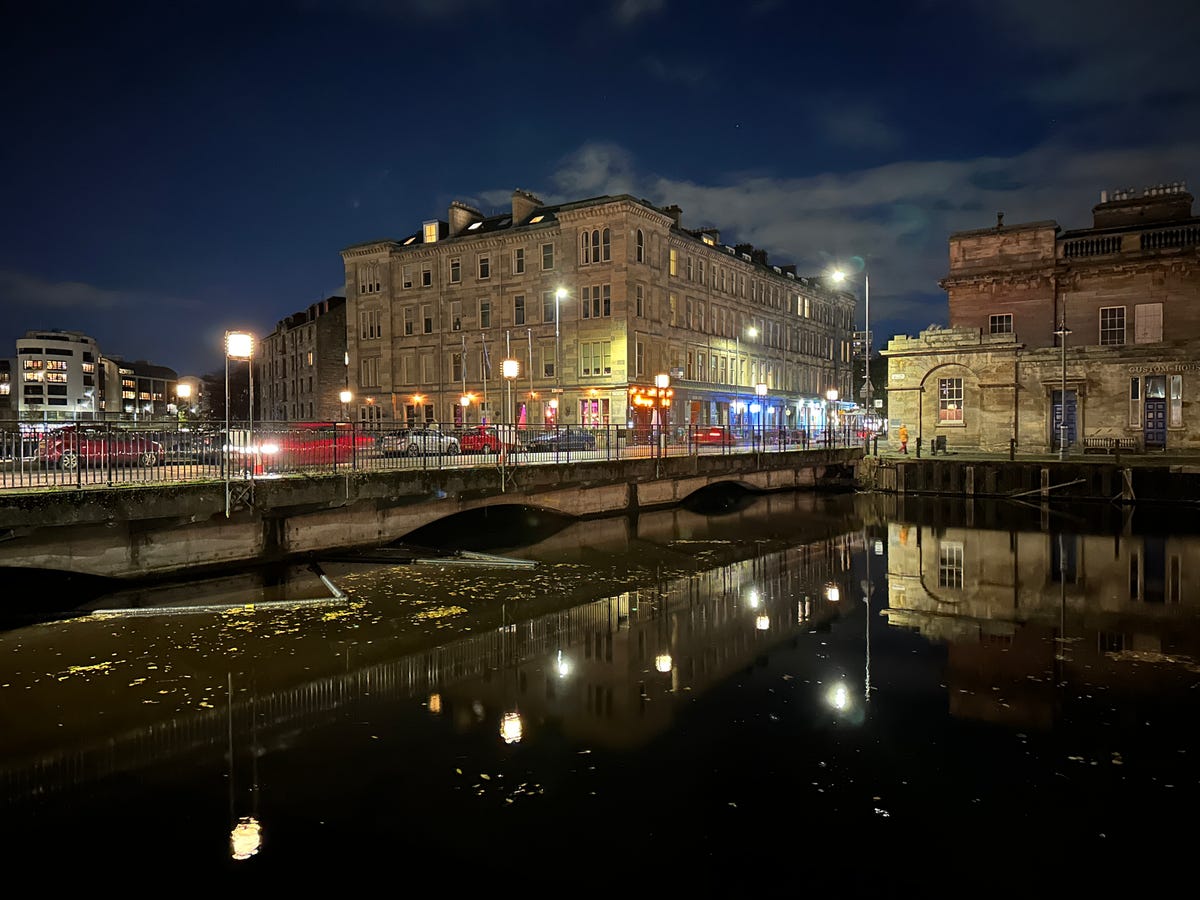 Street lights reflected on a river at night