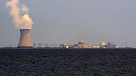 Salem nuclear power plant generating energy. Picture taken from across the Delaware Bay.