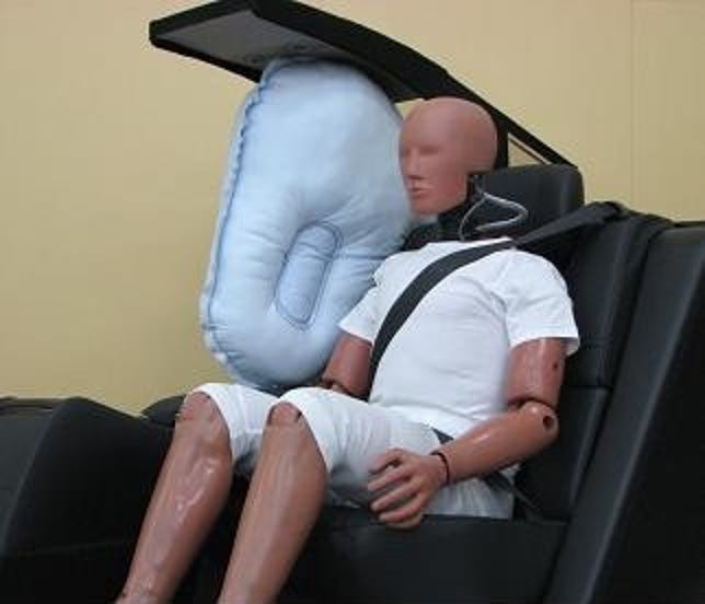 Toyota's rear-seat center airbag deploys from the center console.