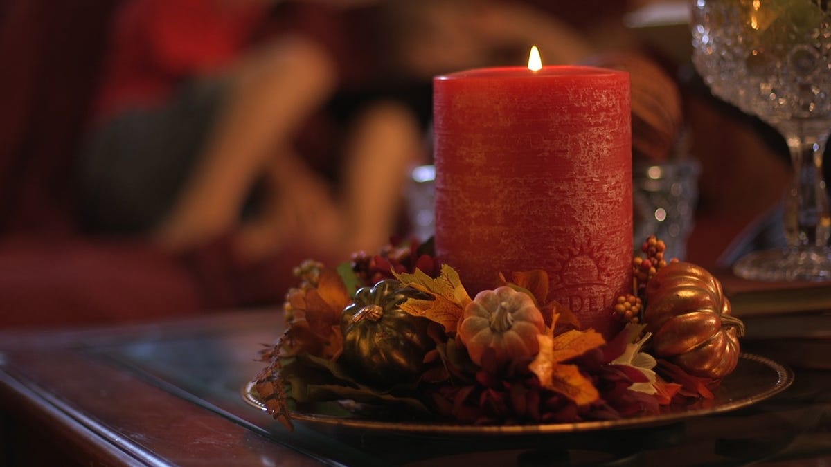 ludela-red-candle-with-autumn-pumpkin.jpg