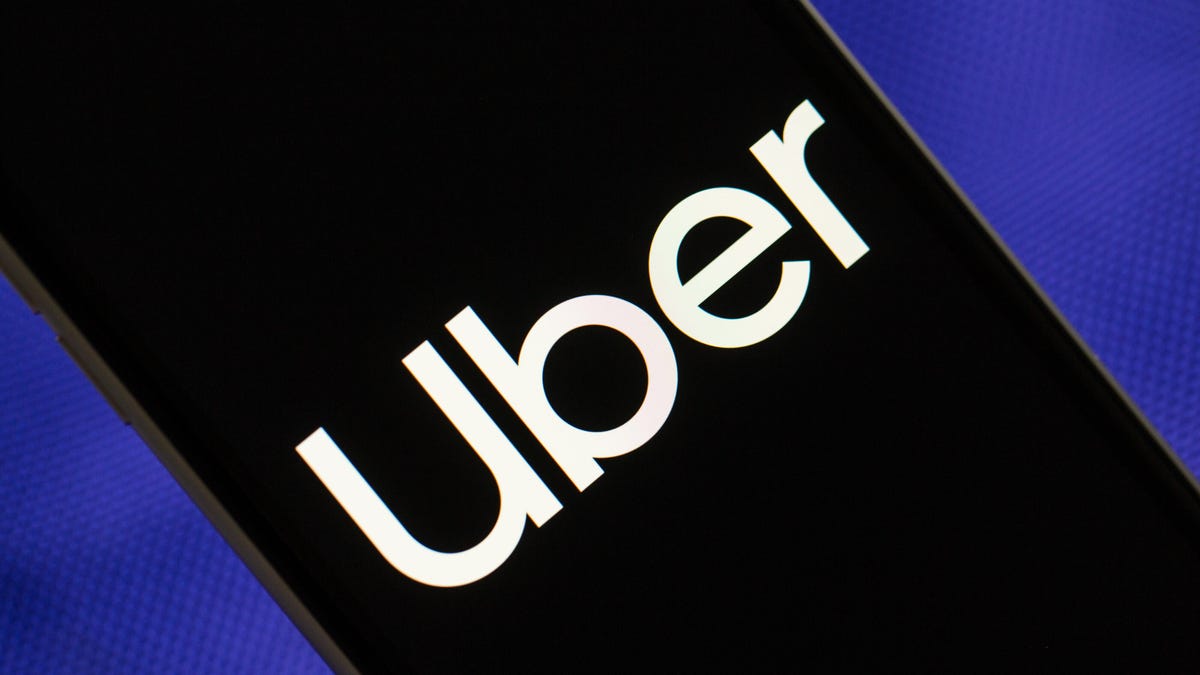 A phone screen showing the Uber logo