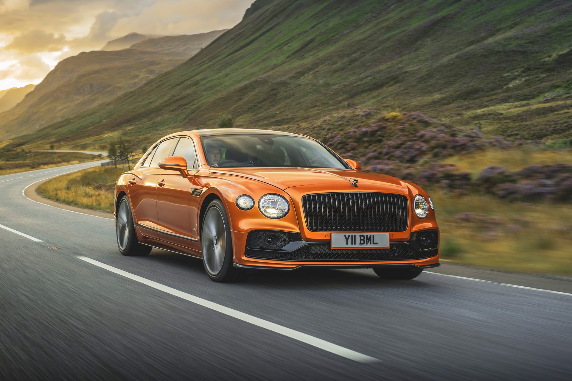 Bentley Flying Spur Speed on the road through rugged terrain
