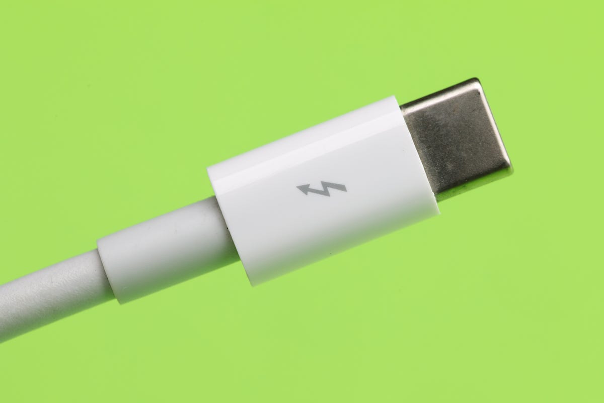 An Apple cable sports Thunderbolt's lightning-bolt icon.