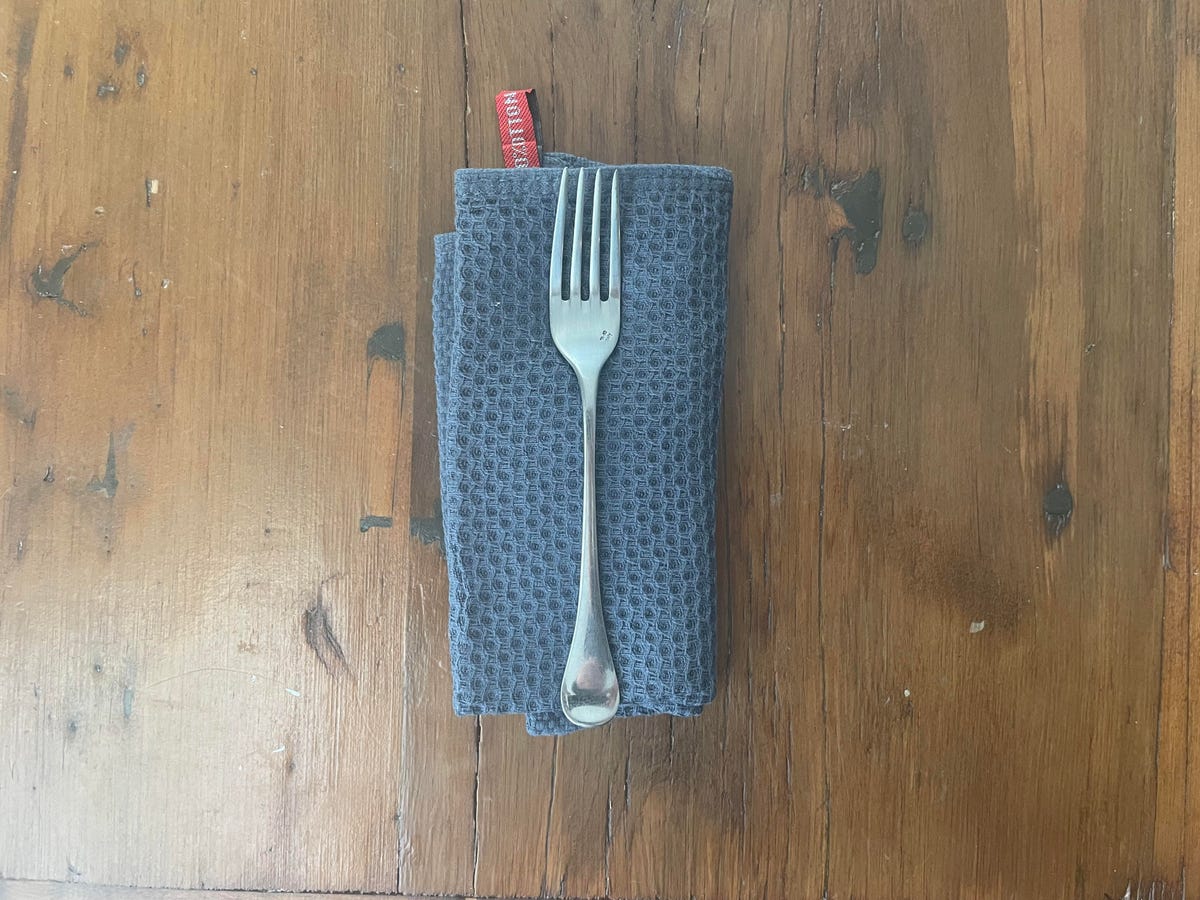 towel with fork on table