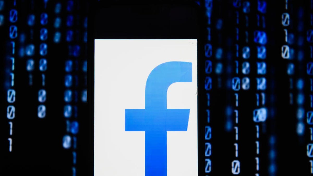 Facebook  logo is seen on an android mobile phone