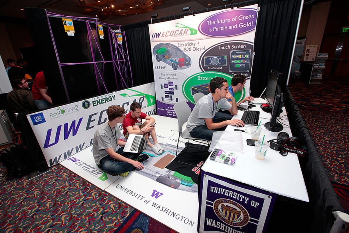 Students setting up their booths at the 2012 EcoCar Challenge sponsored by GM and the Department of Energy