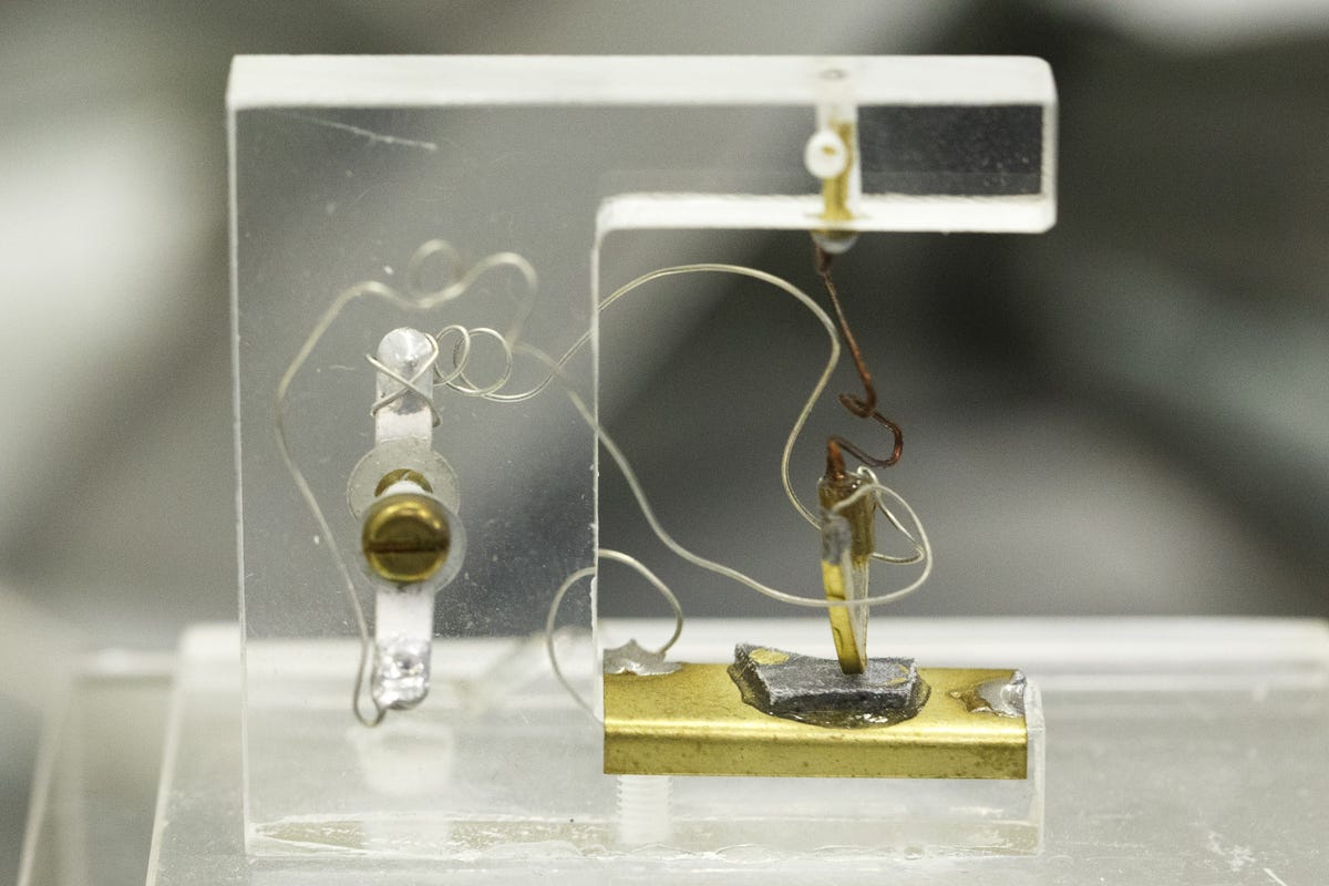 A scale model of the first transistor, developed at Bell Labs in 1947, is a couple inches wide. It became the foundation of today's computer industry, with today's chips using billions of transistors.