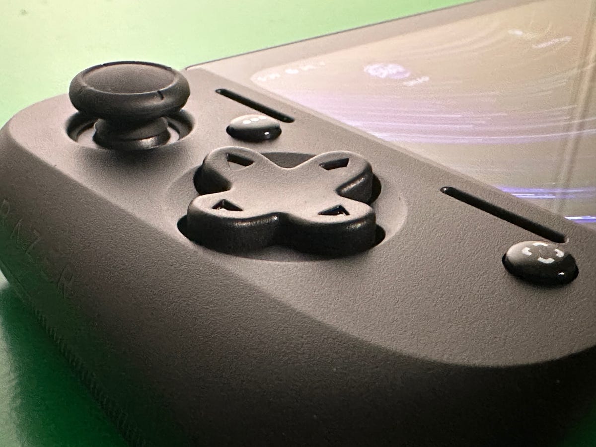 A close-up of game controls on the Razer Edge handheld