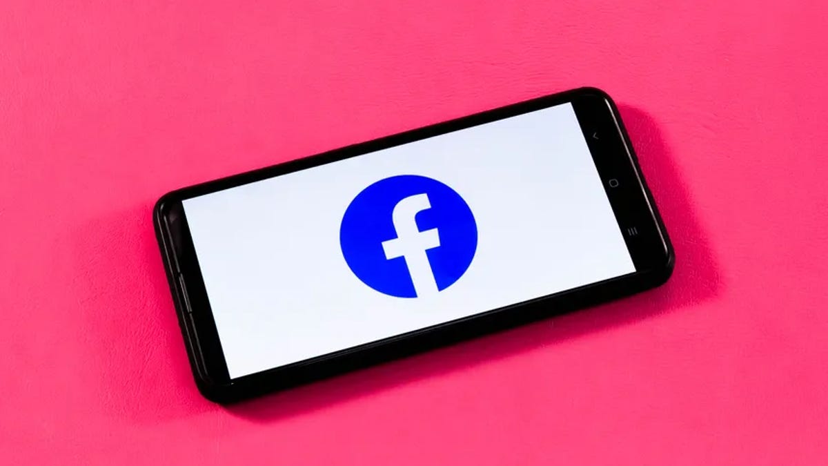 Facebook logo on phone screen