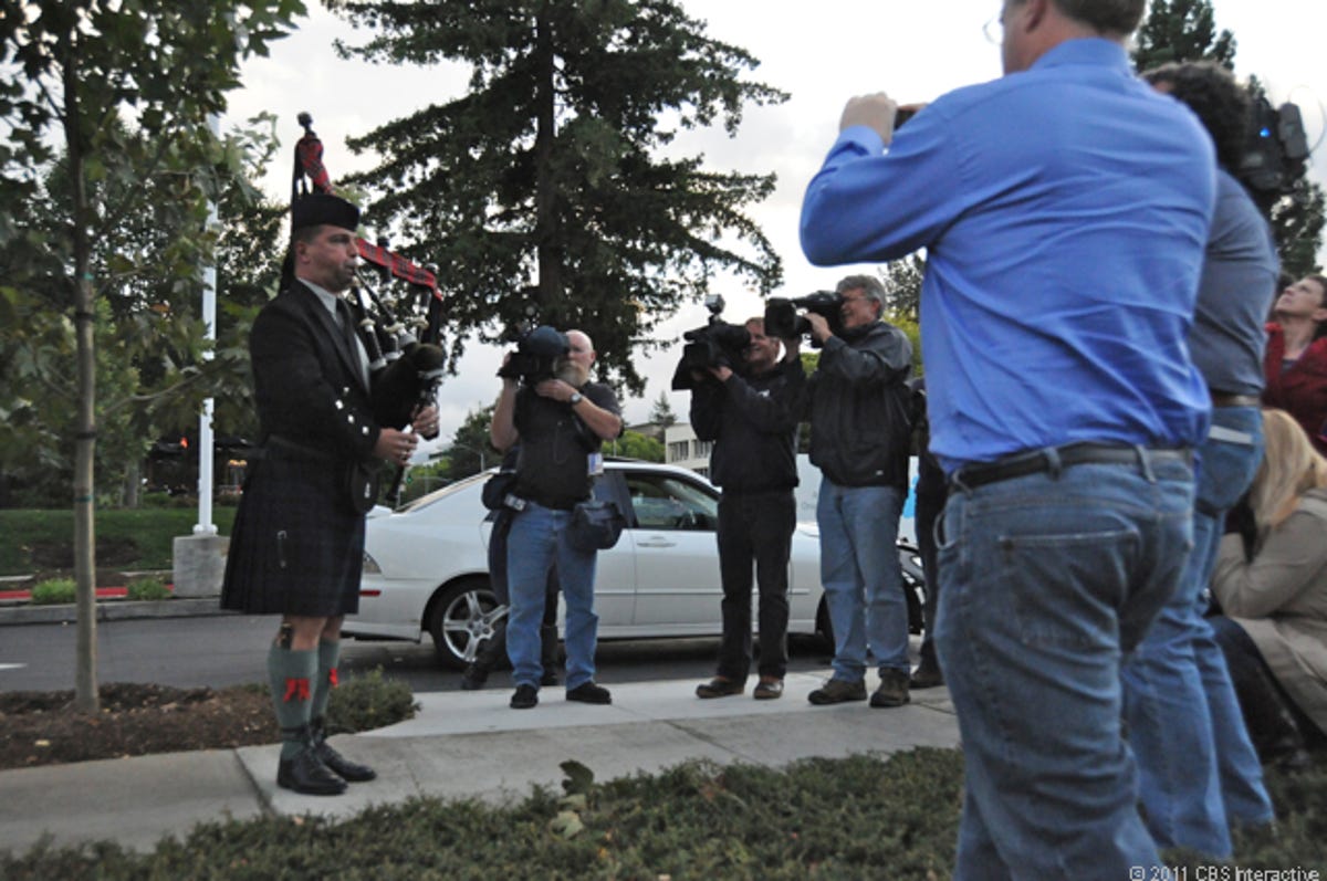 A bagpiper plays at Apple headquarters.
