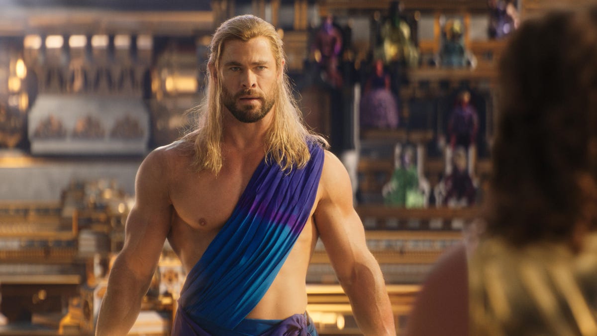 A lightly clad Thor stares intently