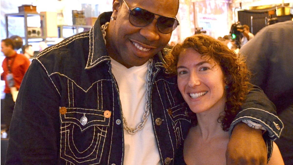 Rapper Busta Rhymes and CNET's Jessica Dolcourt at the Google Music Launch in LA on 11/16/2011.