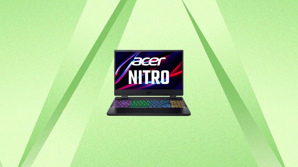 An Acer Nitro 5 gaming laptop against a green background.