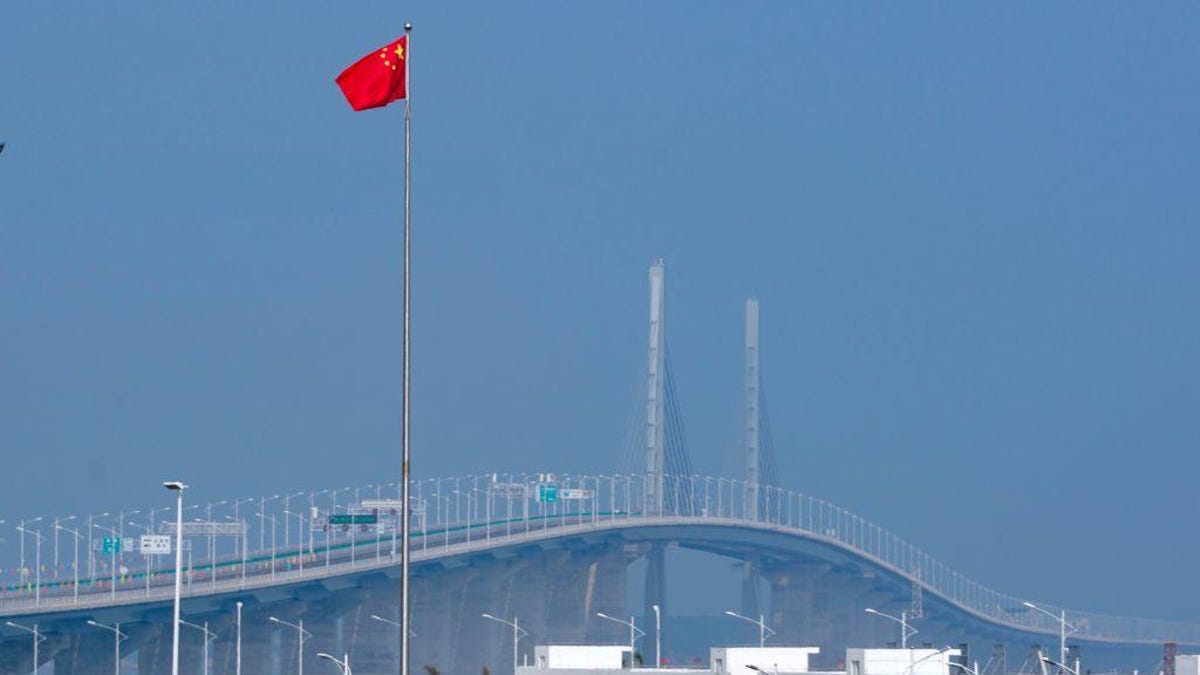 Hong Kong-Zhuhai-Macao Bridge Opens To Traffic