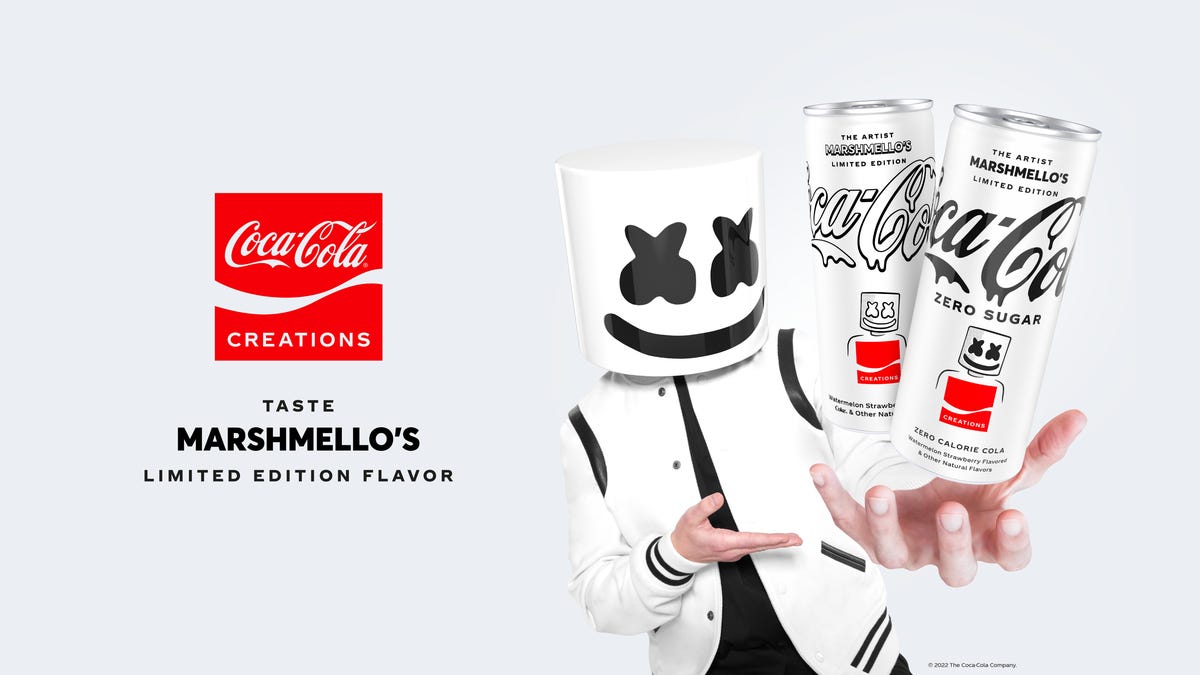 Artist Marshmello holding two Coca-Cola cans
