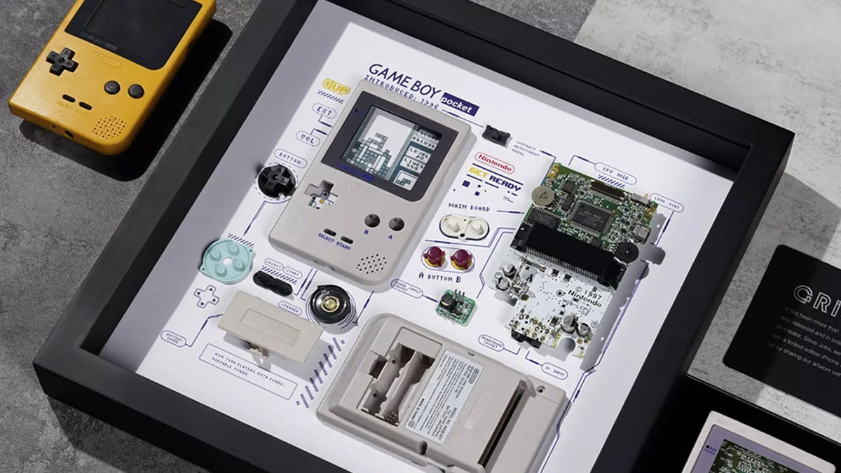 A Grid Studio art piece featuring a Gameboy Pocket is displayed on a flat surface.