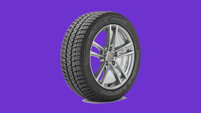 Bridgestone Blizzak WS90 winter tire on a purple background