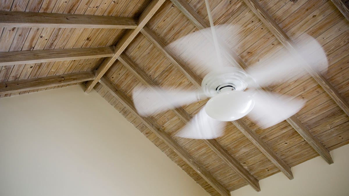 White ceiling fan spinning