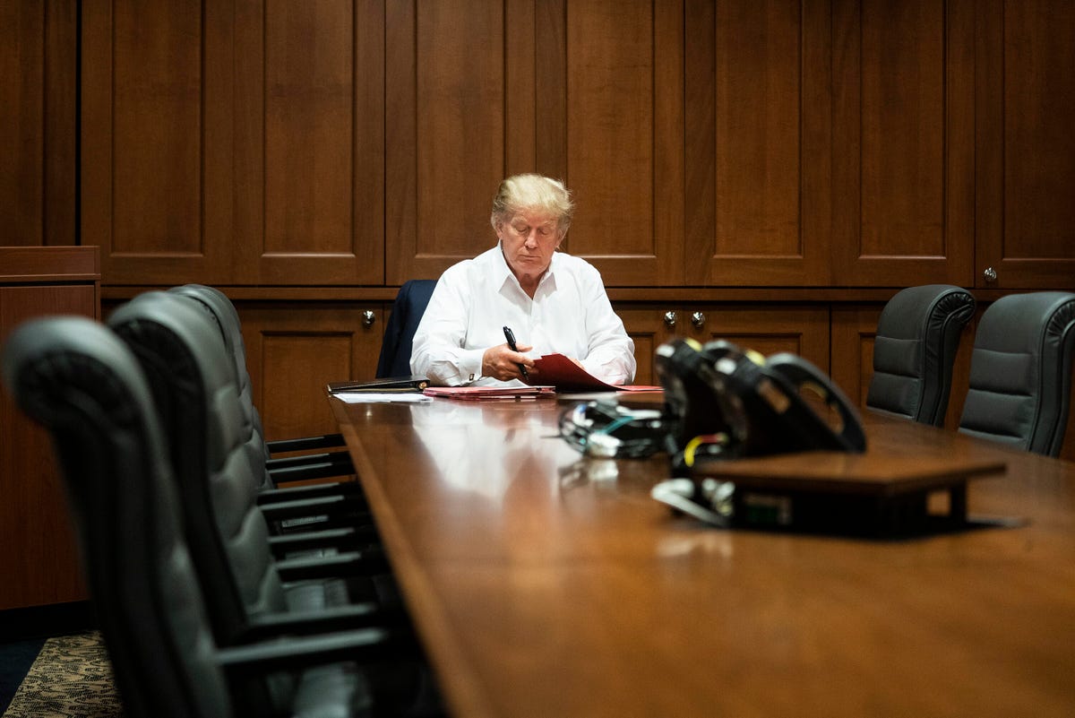 President Trump in Walter Reed hospital in the second of two photos. EXIF data in the photos reportedly indicated they were taken 10 minutes apart.