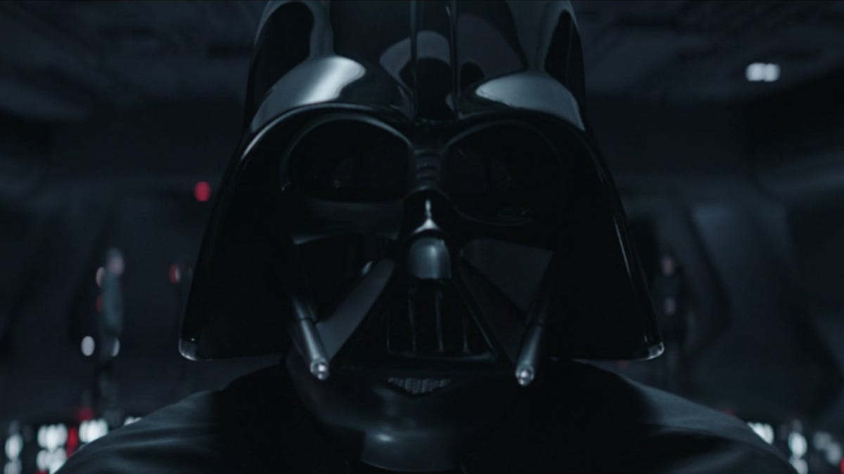 A closeup shot of Darth Vader's helmet as he stands on the bridge of his Star Destroyer Obi Wan Kenobi