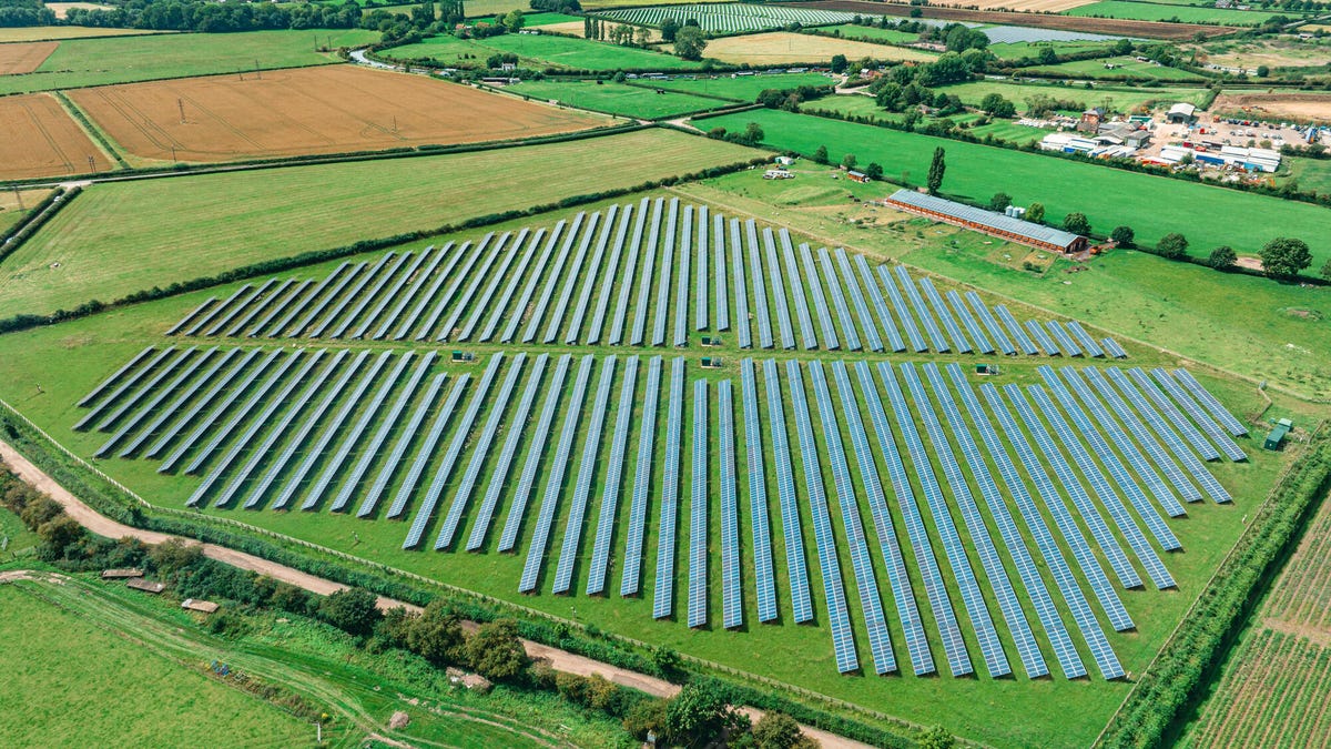 A large solar farm in agricultural land.