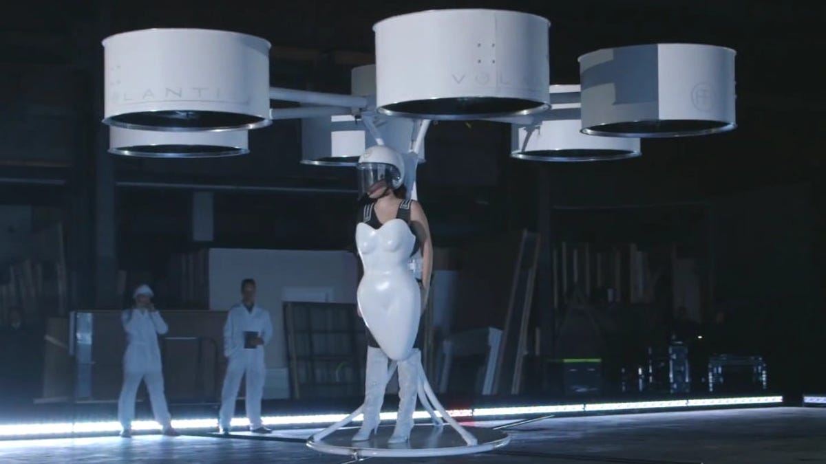 Lady Gaga flying in Volantis dress
