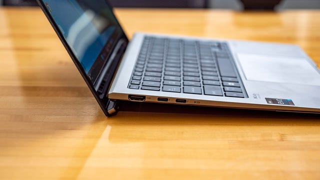 Asus Zenbook S 13 OLED 13-inch laptop open on a table.