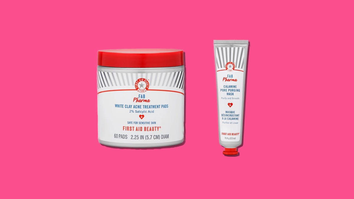 Treatment pads and a pore mask in red, white and gray bottles on a pink background