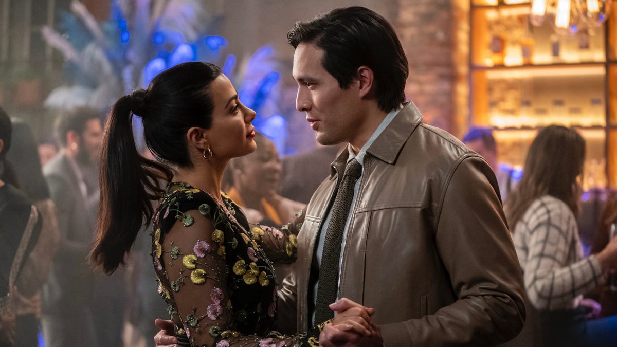 Emeraude Toubia and Desmond Chiam dance together in an image from With Love season 2.